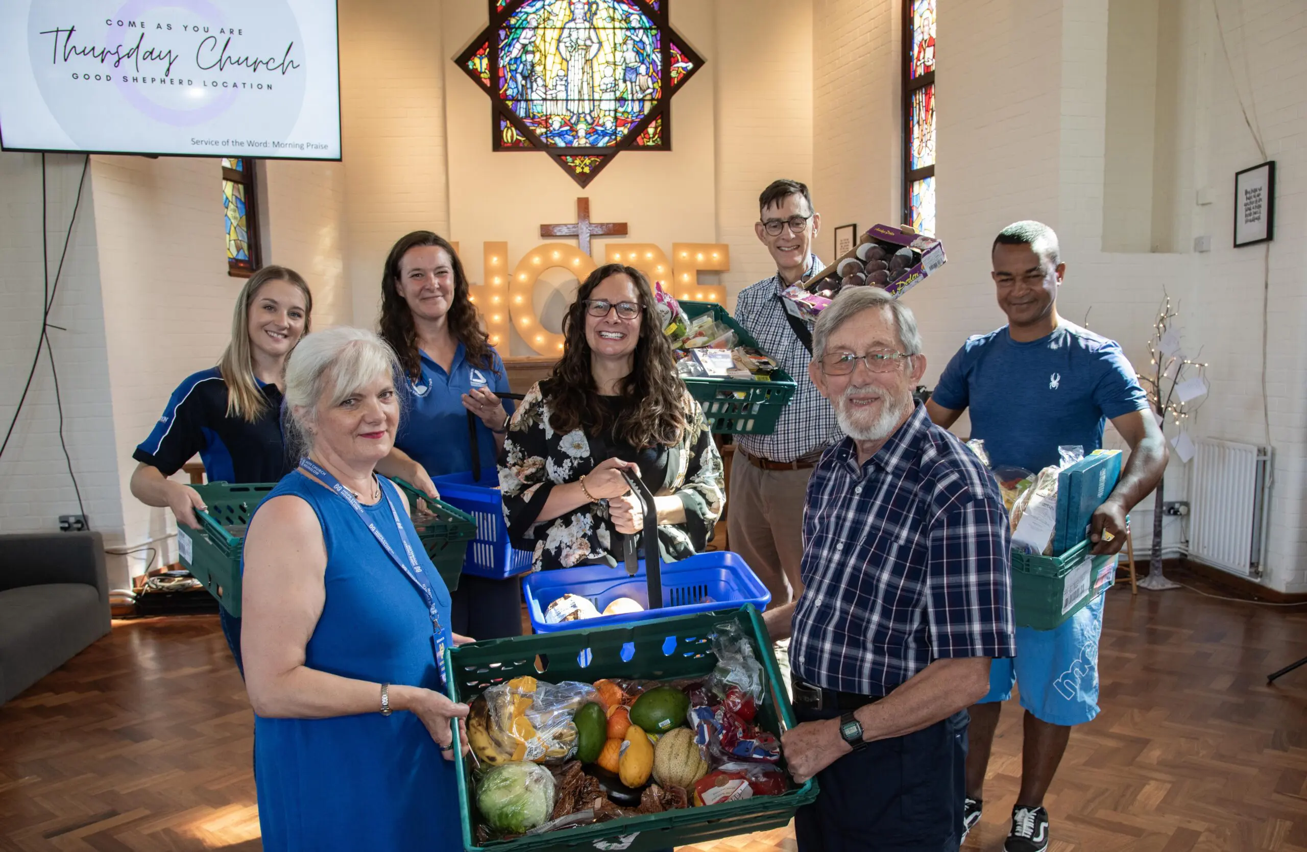 Kirsti Santer and Michelle Jones (back row left) lend a hand at the foodbank, with the Rev Claire Clarke (centre) and Graham Neilson, the church’s Voluntary Buildings Manager, (front right) pictured alongside other team members.